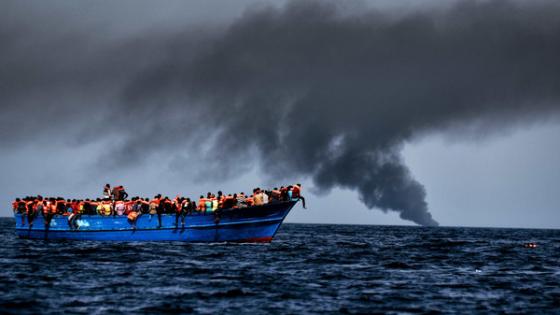 Italy coordinated the rescue of more than 5,600 migrants off Libya, three years to the day after 366 people died in a sinking that first alerted the world to the Mediterranean migrant crisis. / AFP PHOTO / ARIS MESSINIS